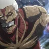 The Armored Titan driving through a battlefield