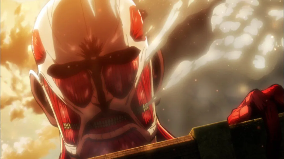The Colossal Titan emerging through smoke